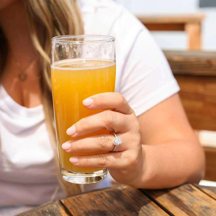 Woman-hoding-beer